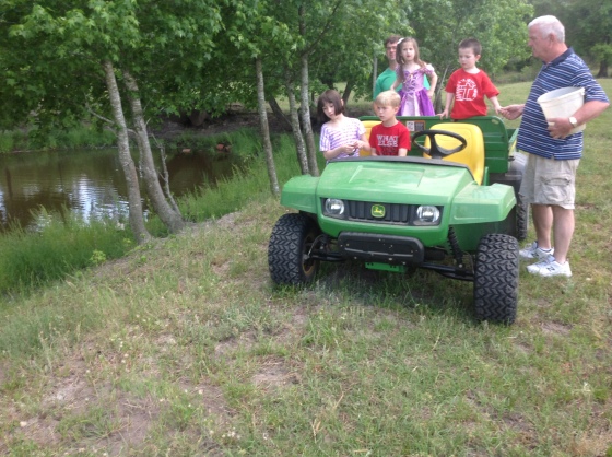 Papa Wilbur and Uncle Keith taking the kids to the pond